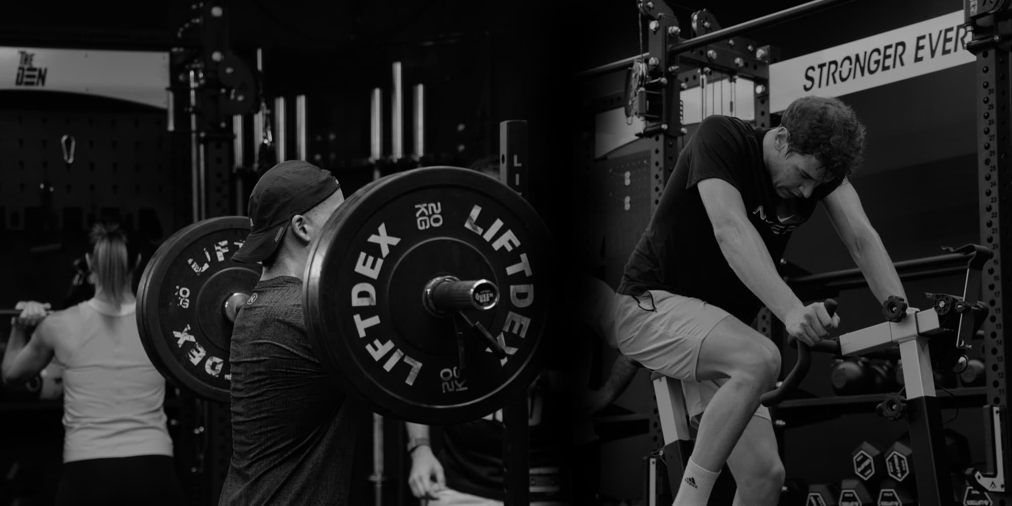 A back squat with a loaded barbell and an athlete on an assault bike at The Den