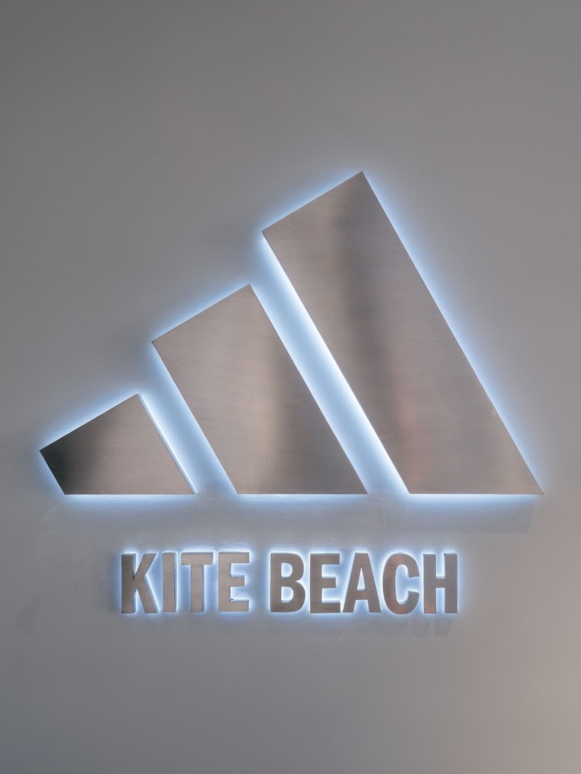 The backlit adidas Kite Beach sign